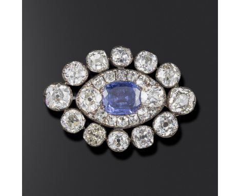 A George III sapphire and diamond brooch, the lozenge set with graduated old cushion-shaped diamonds, centred with a cushion-