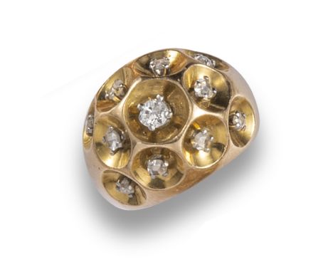 A diamond-set gold bombé ring, the honeycomb design set with graduated rose-cut diamonds and a central cushion-shaped diamond