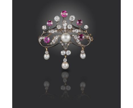 A Victorian ruby, pearl and diamond brooch, of scrolling form, suspending three articulated pearl drops in silver and gold, 3