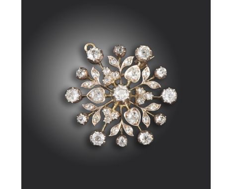 A late Victorian diamond-set foliate circular brooch pendant, set overall with old circular-cut diamonds in silver and gold, 