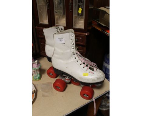 A PAIR OF VINTAGE ROLLER SKATES 