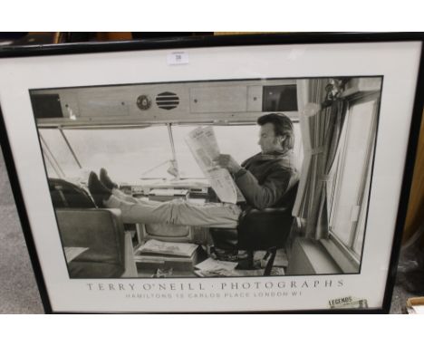 A FRAMED AND GLAZED TERRY O'NEILL PHOTOGRAPHS PRINT OF CLINT EASTWOOD