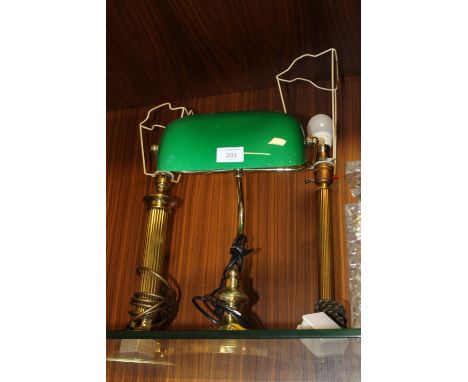 A BANKERS LAMP TOGETHER WITH TWO BRASS EFFECT COLUMN LAMPS (3)