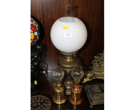A VINTAGE OIL LAMP AND SHADE PLUS TWO OTHERS