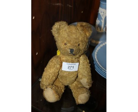 A SMALL VINTAGE TEDDY BEAR