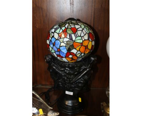 A LARGE FIGURATIVE TIFFANY STYLE TABLE LAMP 