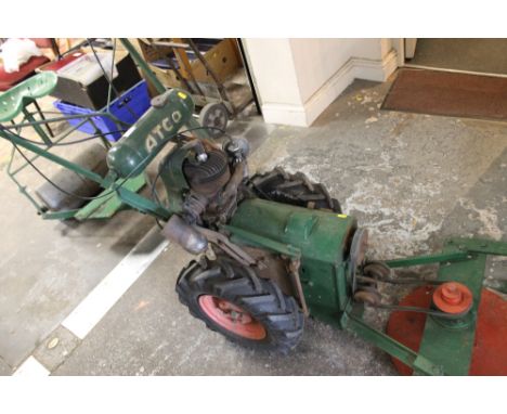 A VINTAGE ATCO SCYTHE RIDE ON MOWER