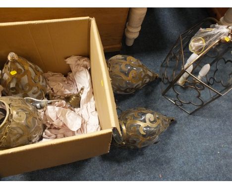 A LARGE BRONZED BRASS POLYGON CEILING LIGHT, TOGETHER WITH A SET OF FOUR BLOWN GLASS CONICAL CEILING LIGHTS WITH METAL FRAMEW