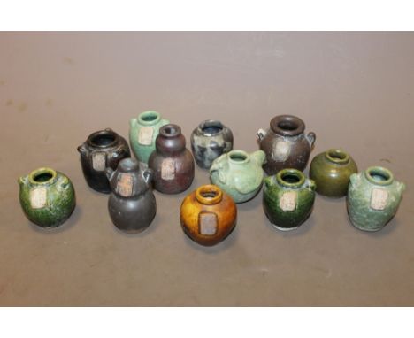 A COLLECTION OF CHINESE STYLE MINIATURE CERAMIC POTS AND ORNAMENTS 