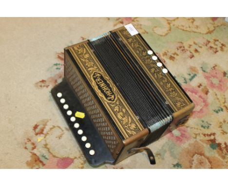 A VINTAGE HOHNER ACCORDION 