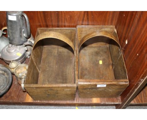 A PAIR OF VINTAGE WOODEN CARRIERS