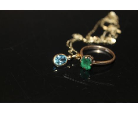 A 9CT GOLD DRESS RING SET WITH A GREEN STONE TOGETHER WITH A BLUE TOPAZ STYLE NECKLACE 