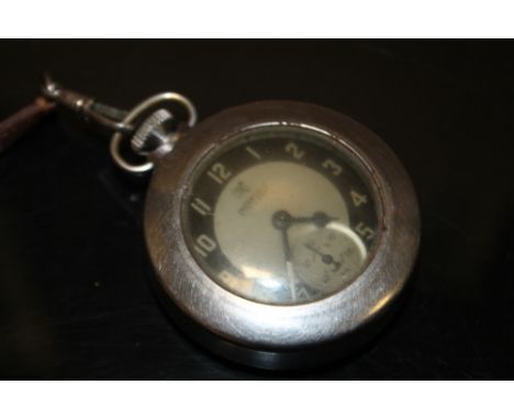 A MILITARY STYLE INGERSOLL TRIUMPH POCKET WATCH WITH LEATHER T BAR STRAP