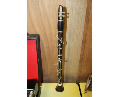 A VINTAGE CLARINET BY HAWKES AND SON OF LONDON