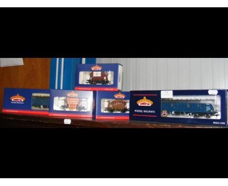 Five boxed Bachmann wagons and parcel coaches 