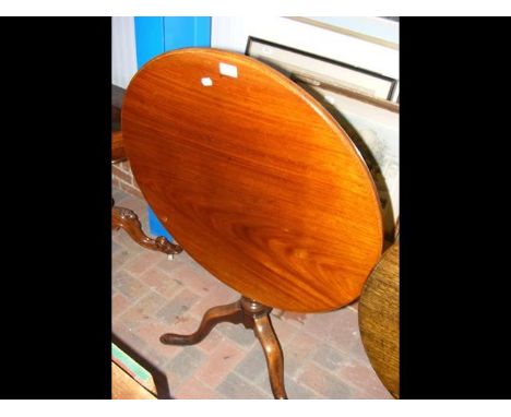 A Georgian mahogany snap-top tripod table - 74cm diameter 