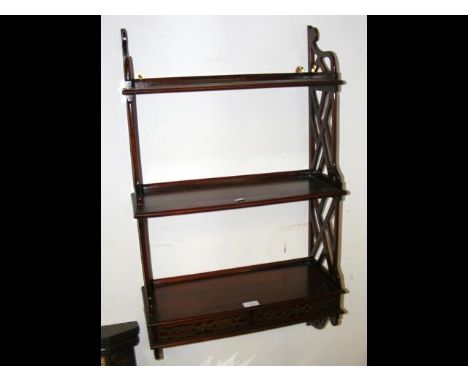 Oriental style three tier hanging shelf with two drawers to the base 