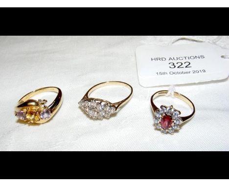 A lady's 9ct gold dress ring, together with two others 