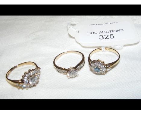 A lady's 9ct gold dress ring, together with two others 