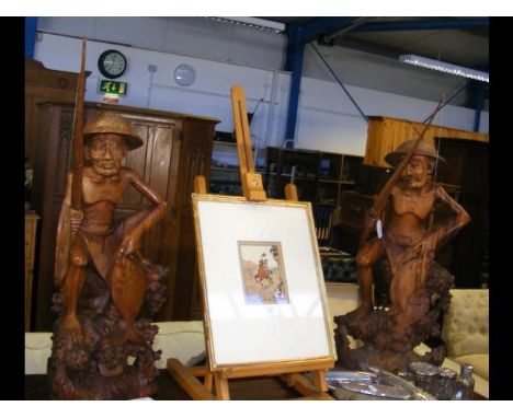 A pair of 60cm high carved wooden Japanese fishermen 