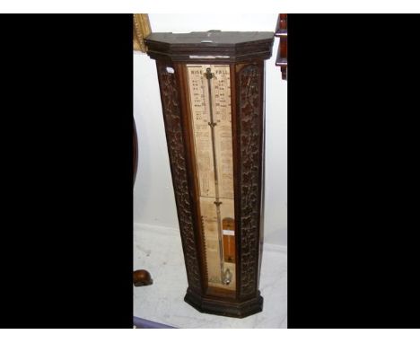 Antique Admiral Fitzroy barometer in carved oak case (lacking glass) - 108cm high 