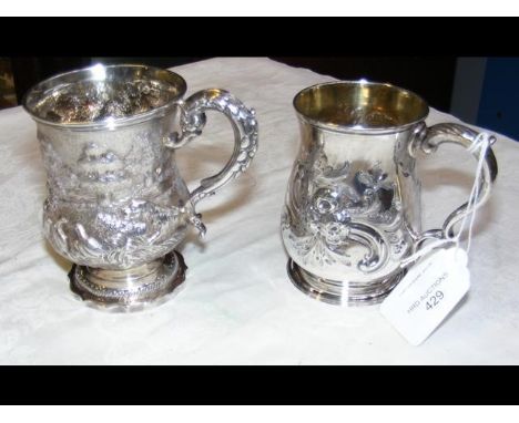 A silver tankard with hunting scene repousse decoration - 10cm high, together with one other CONDITION REPORTAs per imagesGoo