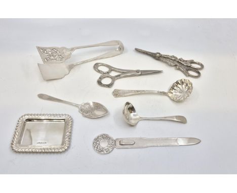 A silver bookmark/letter-opener, by Victoria Silverware Ltd, Birmingham 1995, the terminal cast signs of the zodiac to one si