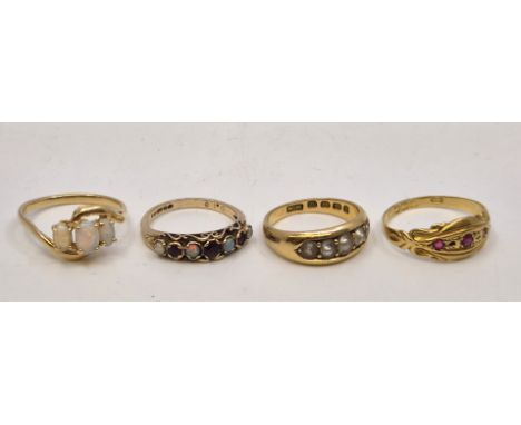 An 18ct. gold and pearl ring, set five graduated pearls, size UK M (gross weight 4.7g), together with an 18ct. gold and red s