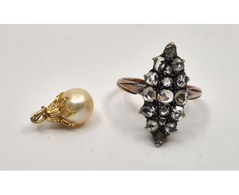 An early 19th century yellow, white metal and diamond ring,&nbsp;having marquise mount set seventeen rose-cut diamonds, band 