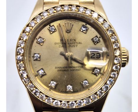 An 18ct. gold ladies Rolex Oyster Perpetual Datejust Superlative Chronometer automatic wristwatch, model 69178, having signed