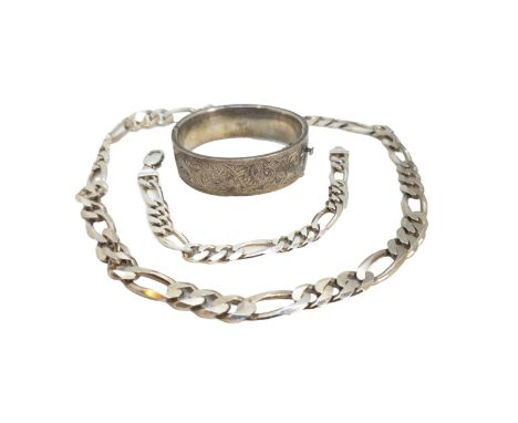20th Century A group of three silver jewellery items [a] A heavy flat curb-linked necklace and bracelet (Approx. 109.14 grams
