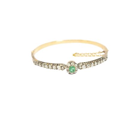 British Circa 1880 A pretty emerald, diamond and 18 carat rose gold bangle In the original toulled leather presentation case 