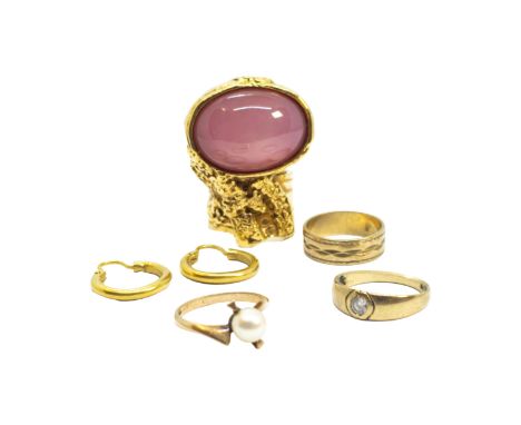 British Contemporary A mixed lot of jewellery [a] Yves Saint Laurent, A large faux star ruby and gold dress ring [b] A pair o