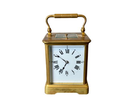 Continental Early 20th Century A repeating carriage clock With a brass gorge case, in working order  Dimensions: 4.5 in. (H) 