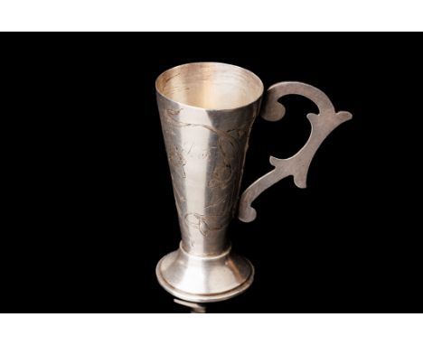 Silver vodka charka with shaped handle. Beautiful chiseled floral decoration. Manufacturer mark PB. Period of reign of Nichol