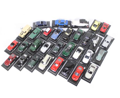 Del Prado, Other - A collection of 32 1:43 scale diecast vehicles from the Del Prado 'Ultimate Car Collection' series. Lot in