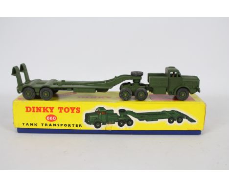 Dinky - A boxed Mighty Antar Tank Transporter # 660. The model appears Near Mint with little sign of play use but has some li