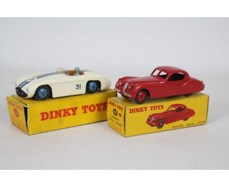 Dinky - 2 x boxed cars, Cunningham C-5R in white # 133 and Jaguar XK120 Coupe in red # 157 in its correct colour spot box. Th