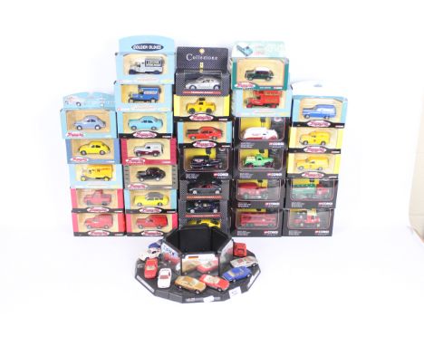 Corgi, Matchbox, Other - 30 boxed diecast model vehicles in various scales, with an unboxed Matchbox Showroom set in playworn