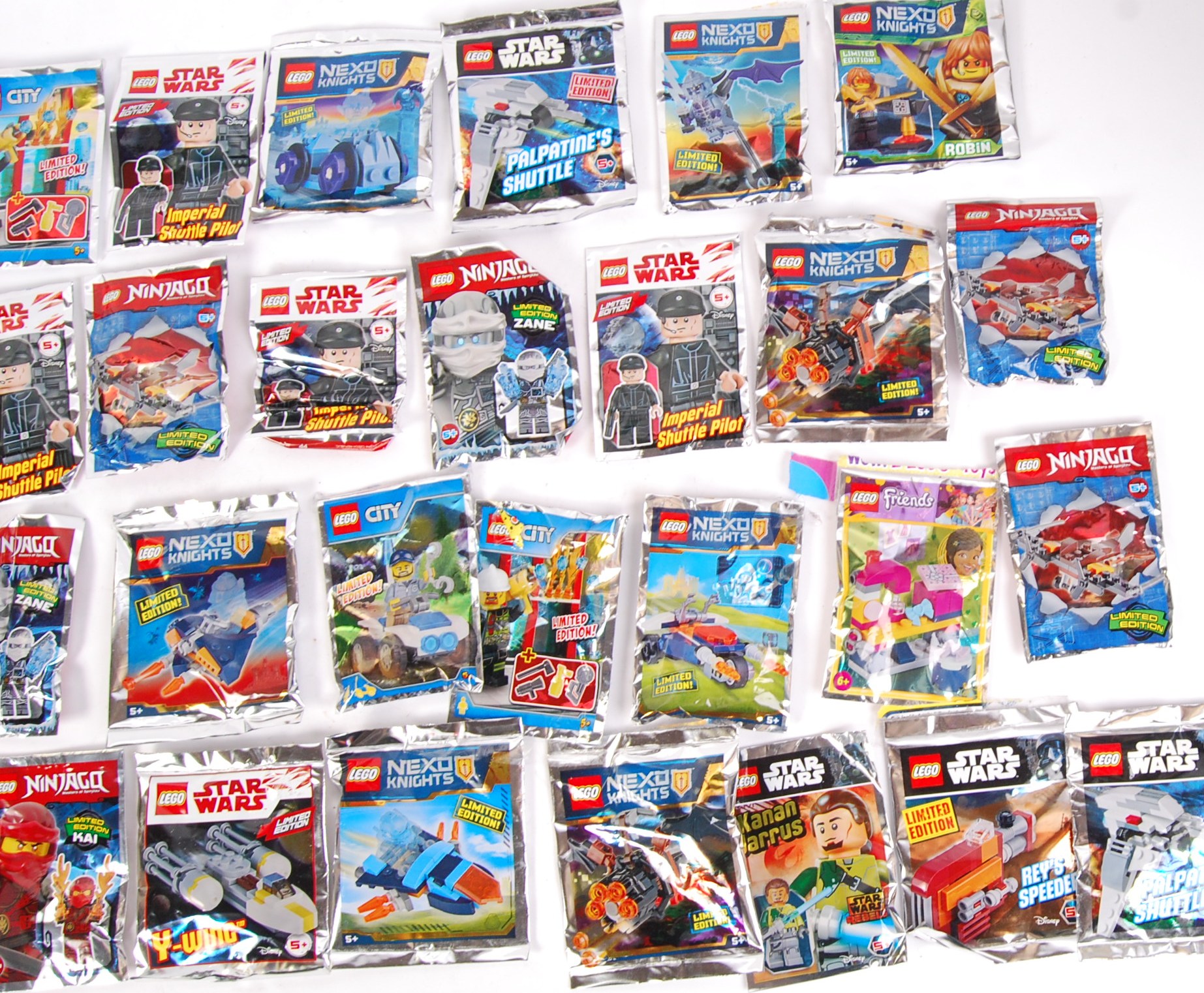 A large collection of approx 75x Lego poly bag sets for various series ...