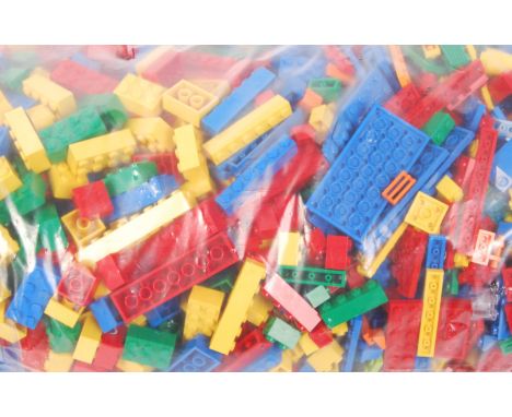 A large bag of approx 5kg of vintage loose Lego. Largely standard bricks, but some windows and other parts present. Good sele