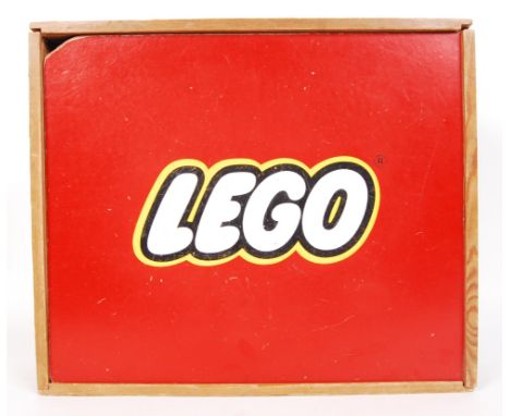 An original vintage Lego classic wooden storage box for early sets. The wooden box having exposed joints and sliding red door