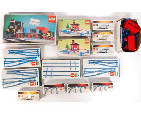 A large collection of assorted boxed and loose vintage Lego train related accessories. Many within the original boxes. To inc