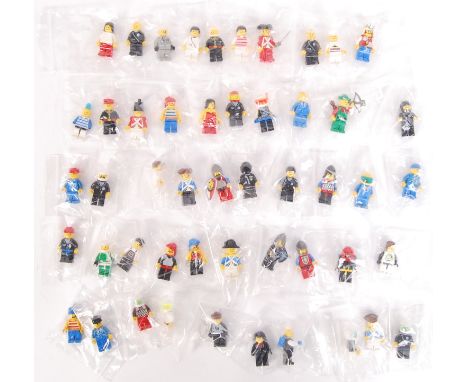 A collection of 50x assorted vintage Lego minifigures . Largely 1980's to include Town, Space, Pirates, Knights and various o