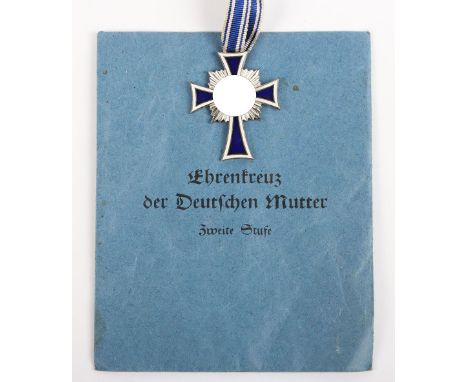 Third Reich Mothers Cross in Silver with Paper Packet of Issue, fine enamel silver grade example with Adolf Hitler signature 