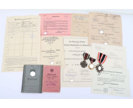 WW2 German Artillery Regiment Medals, Citations and Wehrpass Grouping of Wachtmeister Johannes Graf, the grouping consists of