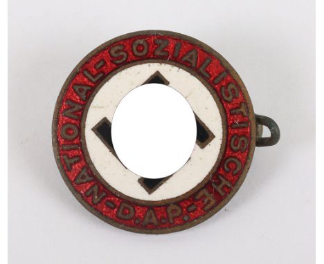 Third Reich NSDAP Party Badge, being a small type enamel example with the reverse being marked ‘GES GESCH’. Complete with the