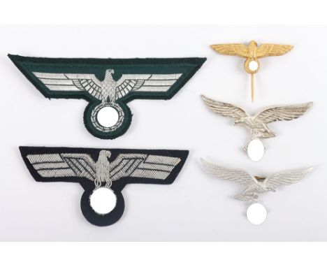 Grouping of WW2 German Cloth and Metal Insignia, including scarce eagle for a Luftwaffe tropical sun helmet, aluminium Luftwa