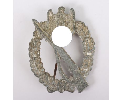 WW2 German Army / Waffen-SS Infantry Assault Badge in Silver, well worn zinc example with pin and catch fixing to the reverse