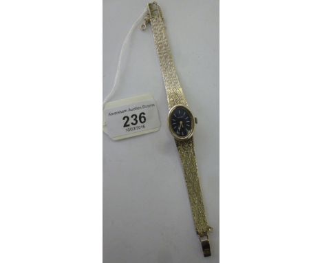 A lady's Tissot silver cased bracelet watch, faced by a baton dial  stamped 925        11